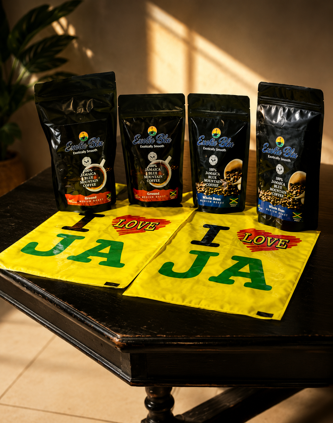 Exotic Blu coffee packages displayed on a table alongside I Love Jamaica promotional items.